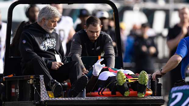 Eagles defensive end Josh Sweat getting carted off the field.
